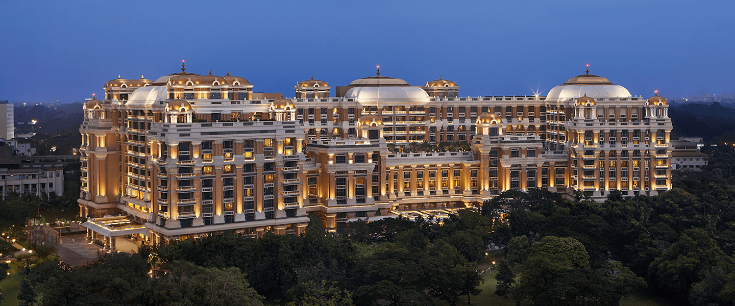 ITC Grand Chola hotel, Chennai, lit up at dusk